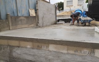 Maçonnerie paysagère création parking murs Aidlib